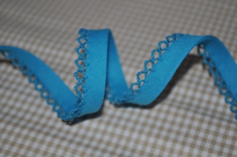 Schrägband uni mit Häkelborte türkis