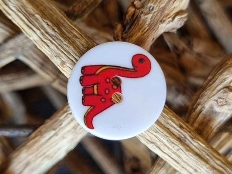 Kinderknopf Dinosaurier rot