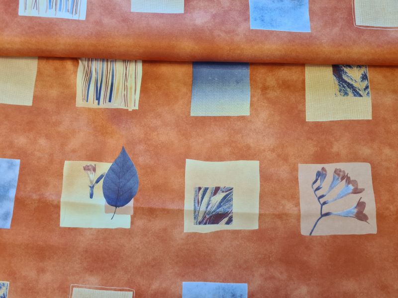 Dekostoff Orange mit Quadraten Blättern Streifen