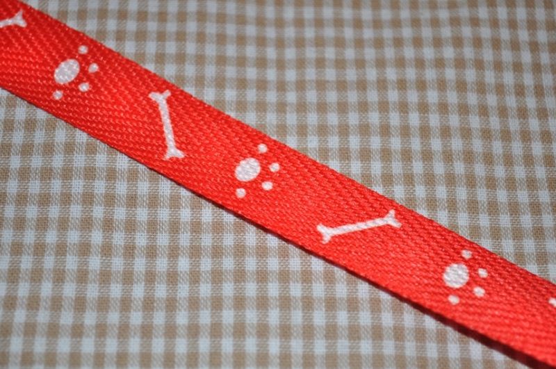 Gurtband 17 mm Tatzen/Knochen rot