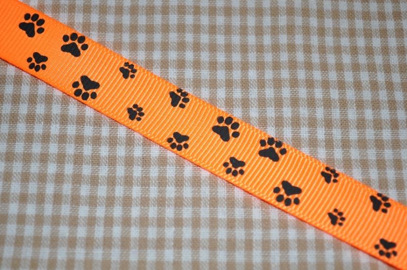 Ripsband Pfoten 15mm neonorange/schwarz