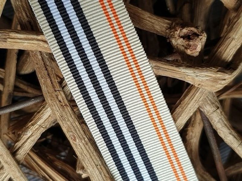 Ripsband creme/schwarz/orange 25mm