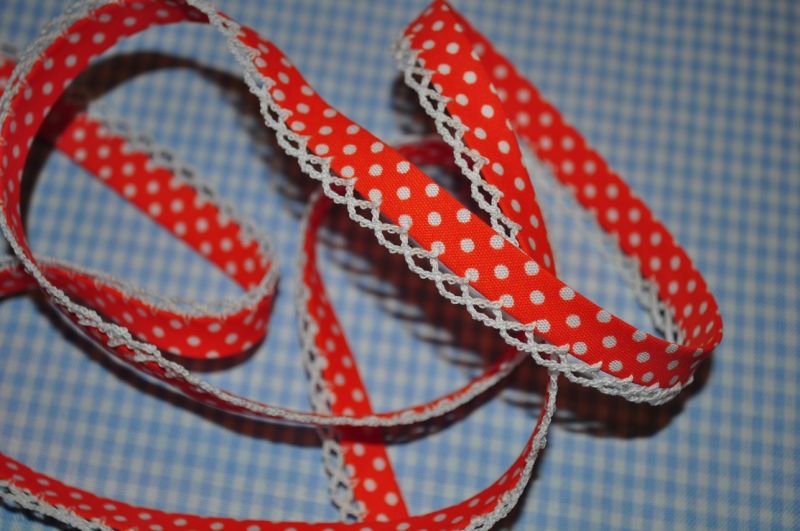 Schrägband Punkte mit Häkelborte orange