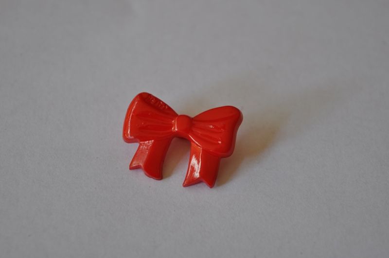 Knopf Schleife rot