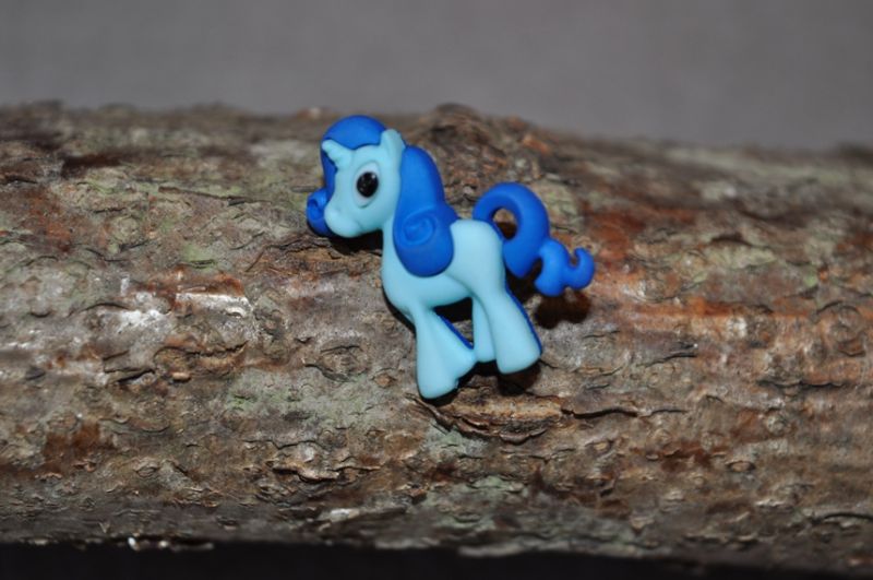 Knopf Öse Polyester Einhorn hellblau