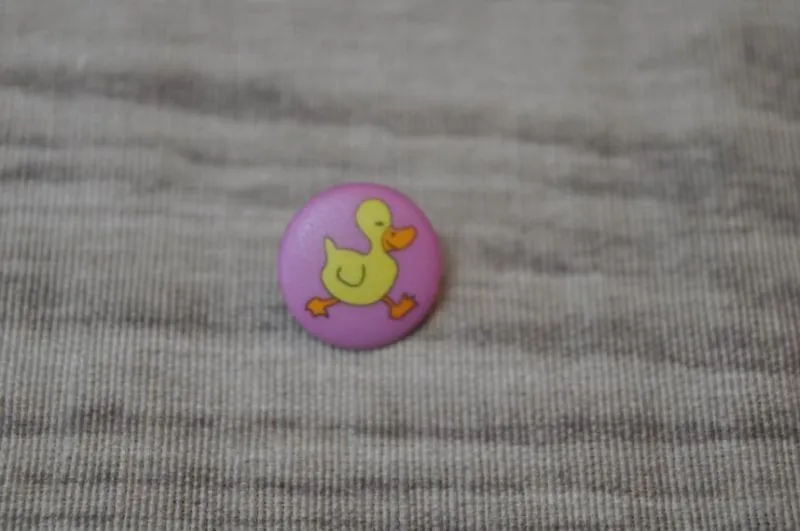 Knopf 15mm Entchen flieder