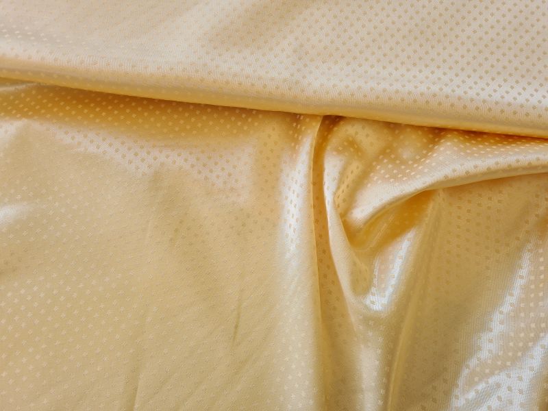 Jaquard Satin Gelb mit Tupfen