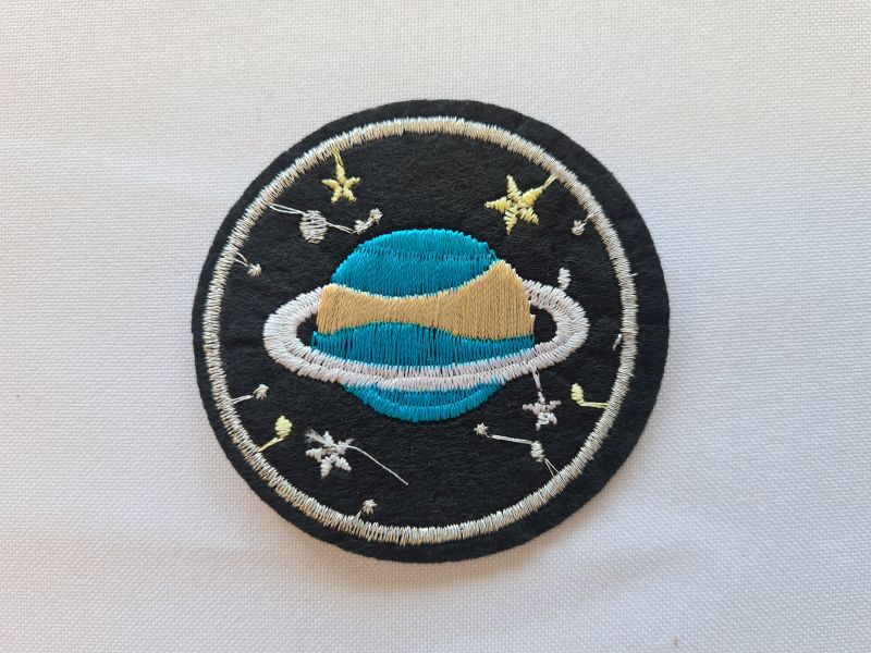Applikation/Bügelbild blauer Planet mit Ring