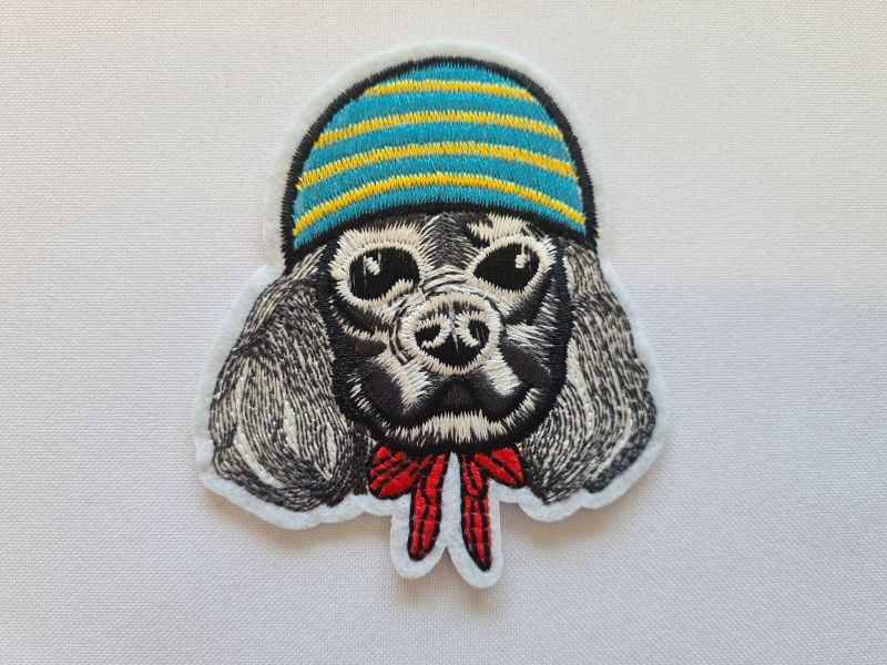 Applikation/Bügelbild Hund mit Mütze