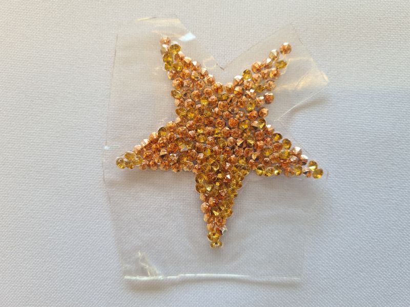 Applikation/Bügelbild Stern aus Steinen