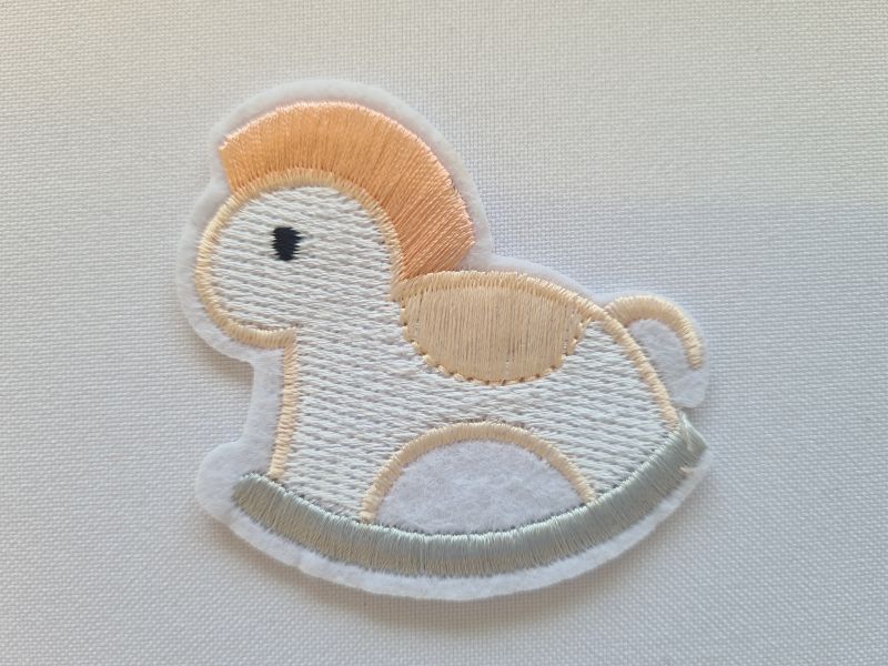 Applikation/Bügelbild Schaukelpferd