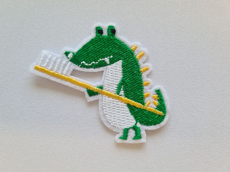 Applikation/Bügelbild Krokodil mit Zahnbürste