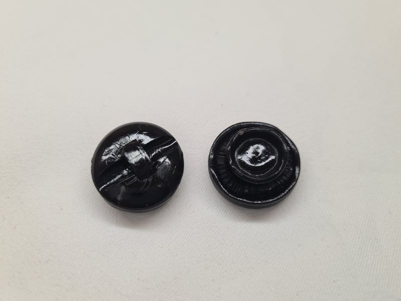 Knopf 22mm Öse Blume Exotisch Schwarz