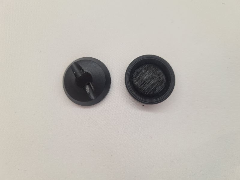 Knopf 22mm Öse Stopfenlook Schwarz