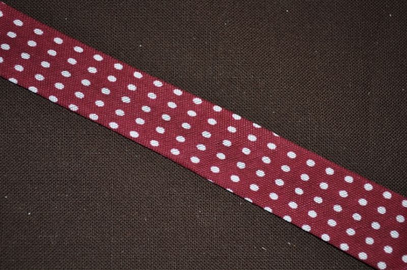 Schrägband Punkte Reihe dunkelrot gefalzt